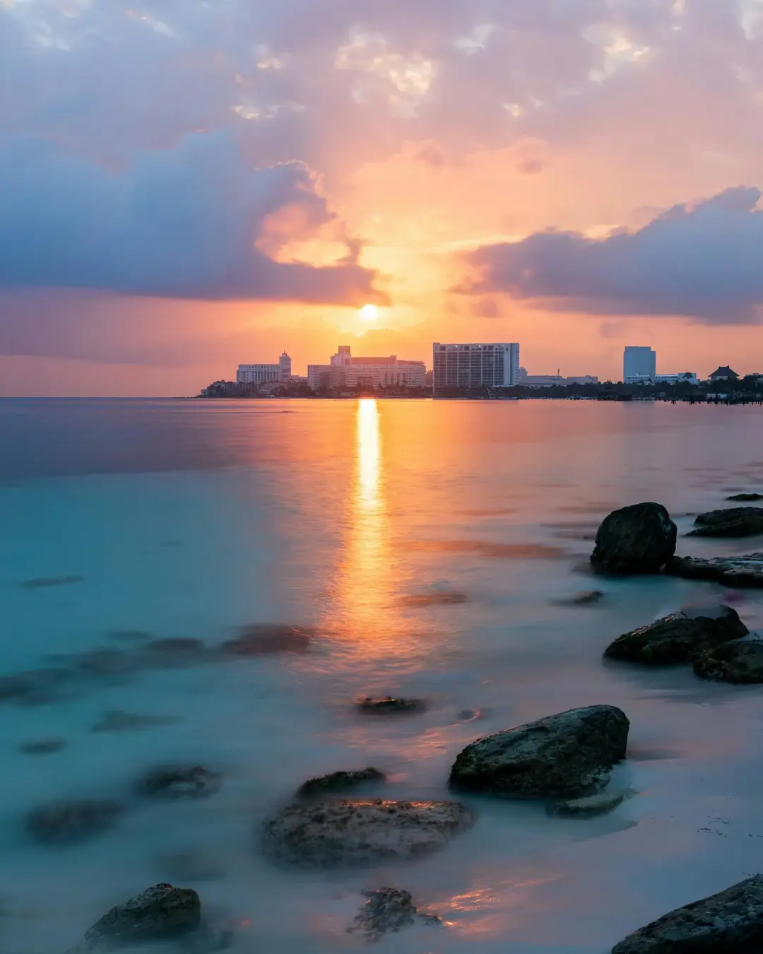 Cancun Hotel Zone at sunset during a Cancun Marathon travel weekend